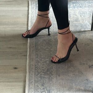 Black strappy leather 100% authentic Manolo Blahnik heels.